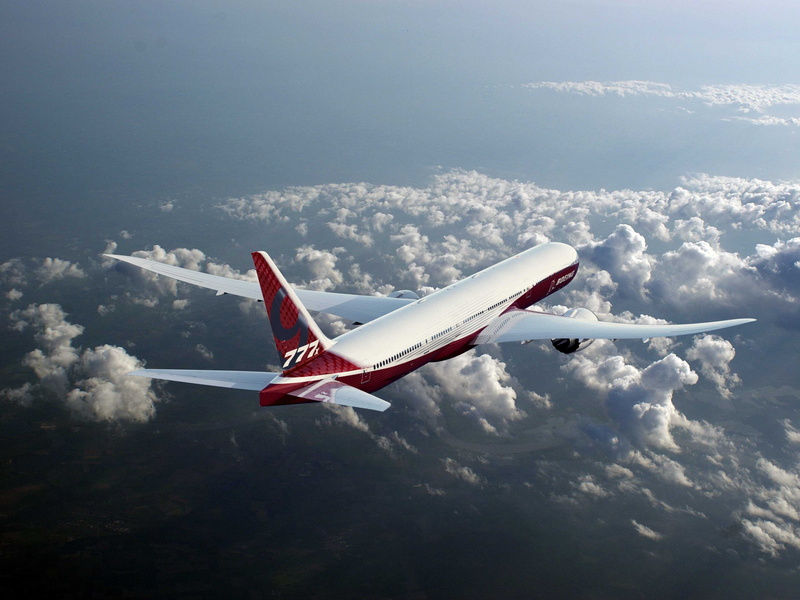 no people, travel, speed, red, plane, motion, cloud - sky, outdoors, Passenger, Boeing, aircraft wing, white, Flight, The plane, mode of transportation
