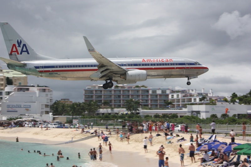 princess juliana international airport, air vehicle, airplane, large group of people, plane, travel, transportation, simpson bay, outdoors, crowd, sky