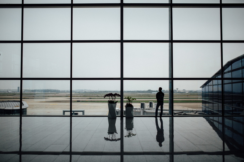 people, near, architecture, glass, airport terminal, sky, travel, transparent, standing, nature, window, glass - material, transportation, waiting, airport departure area