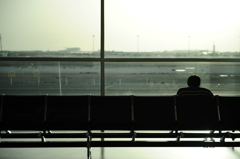 black Color, travel, air vehicle, rear view, seat, sky, airport, urban Scene, glass - material, gang, outdoors, contemplation, airport departure area, people