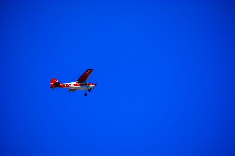1080P, airplane, red plane, day, red, low angle view, aerospace industry, sky, blue, flying, motion, avion, iceland, cessna, air vehicle, no people, nature