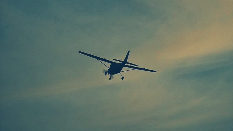 plane, outdoors, day, silhouette, simple, motion, blue, transportation, overcast, 4K, nature, low angle view, flying, no people, sky, journey, minimal