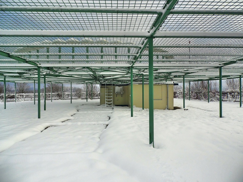 no people, warehouse, covering, snow, ceiling, industry, aircraft, domestic room, business, day, winter, roof beam, air traffic control, nature, cold temperature