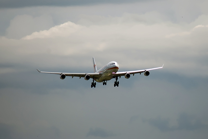outdoors, mode of transportation, landing - touching down, schiphol, cloud - sky, journey, surinam airways, motion, fly, no people, transportation, airplane