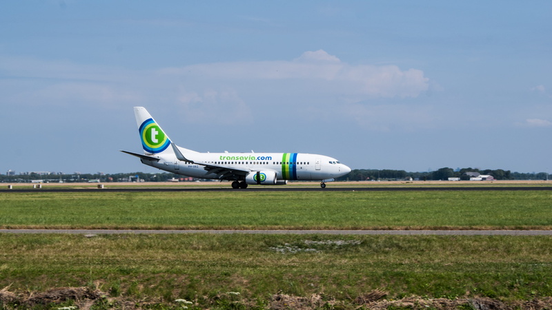 fly, mode of transportation, land, transportation, air vehicle, environment, airport, plane, outdoors, no people, airplane, travel, airport runway, schiphol