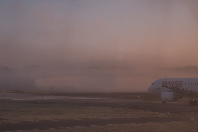 airport zurich, public transportation, dusk, mode of transportation, sunset, outdoors, air vehicle, airport runway, airport, beauty in nature, no people