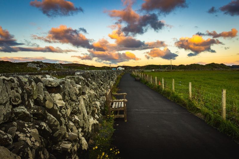 asphalt, idyllic, scenics - nature, sunset, tranquility, clouds, no people, road, land, environment, bench, sky, landscape, orange color, the way forward