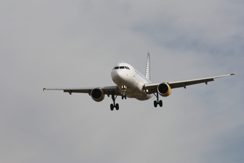 outdoors, daytime, airplane, aerospace industry, travel, air vehicle, sky, journey, leaving, transportation, Vueling, commercial airplane, arrival, low angle view