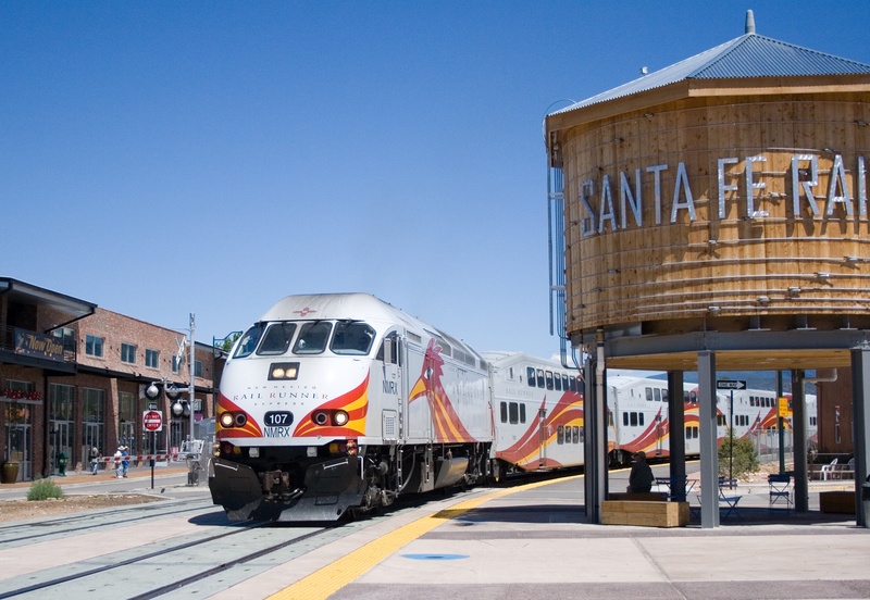 outdoors, day, clear sky, railroad car, architecture, building exterior, 2K, track, new mexico, commercial land vehicle, station, freight transportation