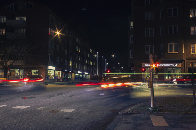 automobile, sweden, illuminated, asphalt, building, cars, street, traffic light, night, street light, downtown, mode of transportation, motor vehicle, transportation