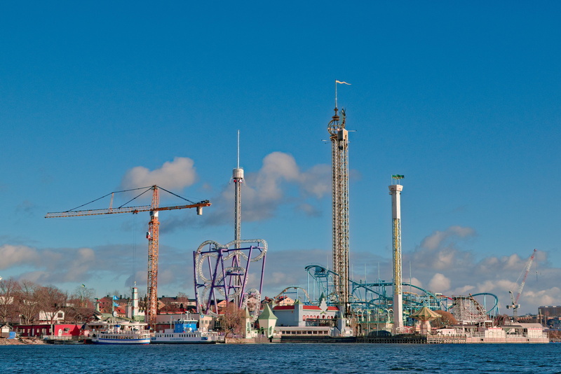 amusement, no people, urban, machinery, transportation, amusement park, sweden, blue skies, outdoors, adrenaline rush, buildings, built structure, tivoli