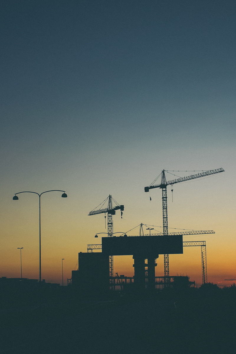 halibut, tower, traffic sign, sky, flounder, construction site, fish, crane - construction machinery, development, silhouette, outdoors, building, sea life