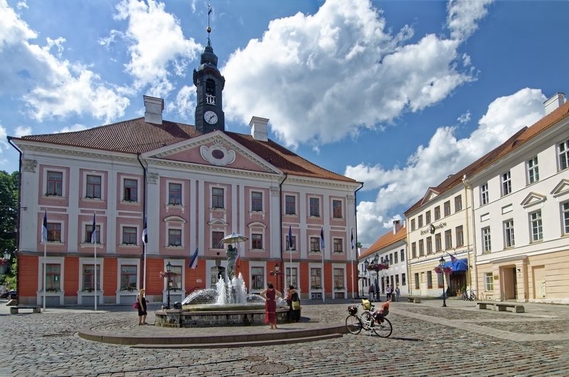 8K, town hall square, mode of transportation, residential district, sky, street, town hall, transportation, group of people, facade, day, fountain, estonia