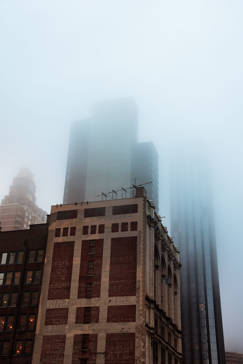 office building, no people, sky, smoke, architecture, weather, building exterior, mist, pollution, metropolis, concrete, skyscraper, high rise, winter