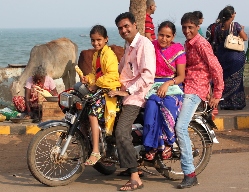 real people, transportation, adult, body, children, men, young men, asian, togetherness, smiling, asian family, outdoors, females, near, people, day, sitting