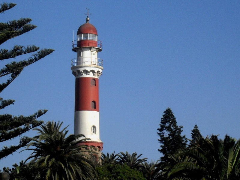 tower, no people, guidance, clear sky, tall, lighthouse, nature, building, security, direction, tree, green trees, tapered, clear day, architecture, low angle view