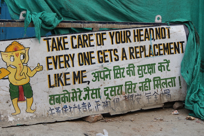 wall - building feature, street art, god, day, wall, sign boards, design, western script, built structure, fun, outdoors, cartoon, art and craft, human representation