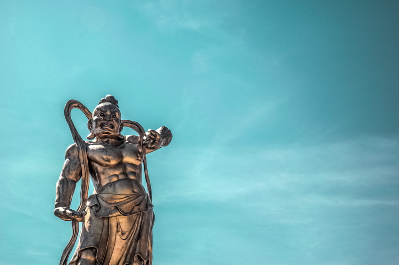 metal, day, art and craft, representation, sky, deity, creativity, hindu, cloud - sky, architecture, statue, blue, sculpture, perspective, monument, daylight