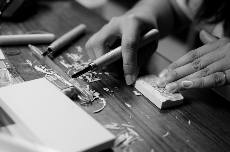 table, person, handcraft, grayscale, selective focus, carving, pencil, hand, office, wood - material, block, hands, black and white, 4K, lifestyles, art and craft