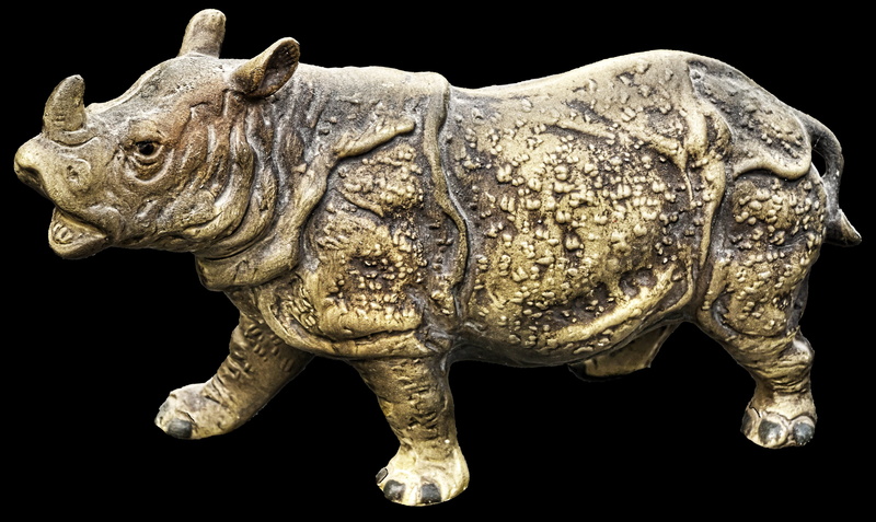 weel, one animal, black background, rhino, ceramic, silver colored, the past, statue, animal representation, representation, no people, antique, side view