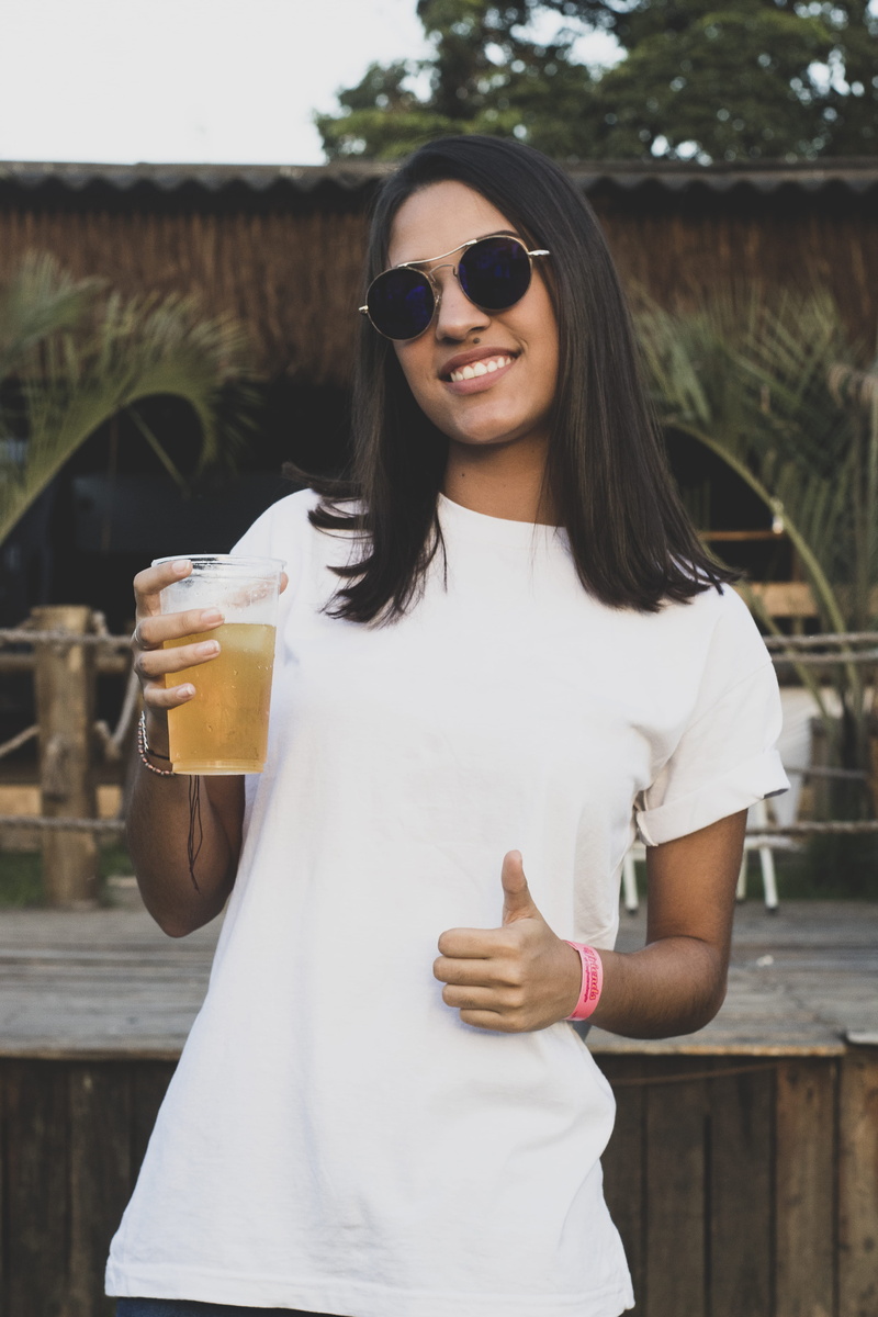 looking at camera, drink, drinking, young women, 5K, glasses, beautiful woman, front view, sunglasses, real people, casual clothing, outdoors, food and drink