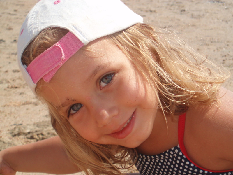 blond hair, one person, sand, umbrellas, headshot, sun, outdoors, holidays, 2K, portrait, child, emotion, smiling, women, lido, childhood, holiday, girls