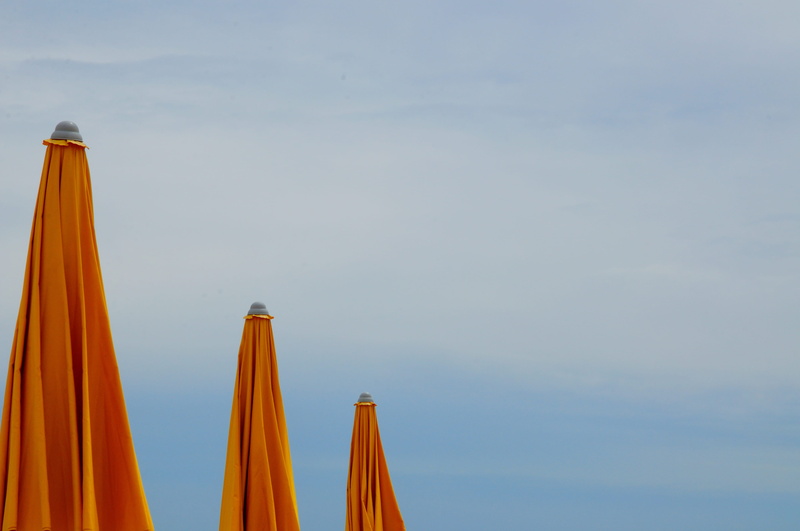 yellow, lido di jesolo, protection, focus on foreground, orange color, outdoors, low angle view, italy, sailboat, architecture, sky, wood - material, nature