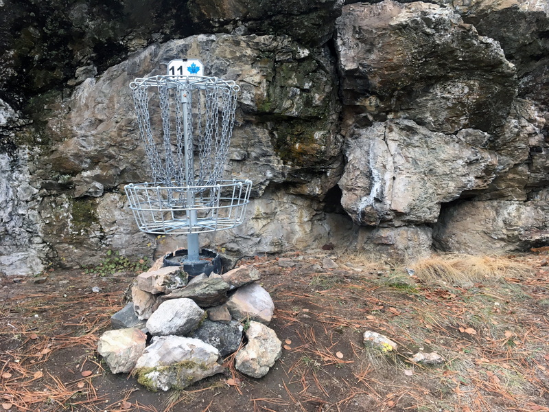 golf, yellow, game, rock formation, day, blue, rock - object, equipment, score, no people, outdoors, metal, grass, flowing water, stone - object, hobby