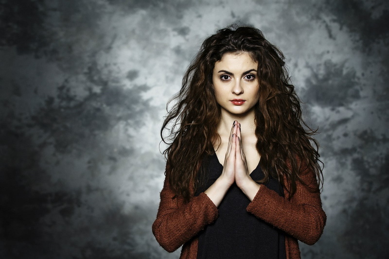 looking at viewer, Eva Josefíková, beautiful woman, front view, face, standing, brunette, wavy hair, beauty, hands, one person, portrait, brown hair, actress