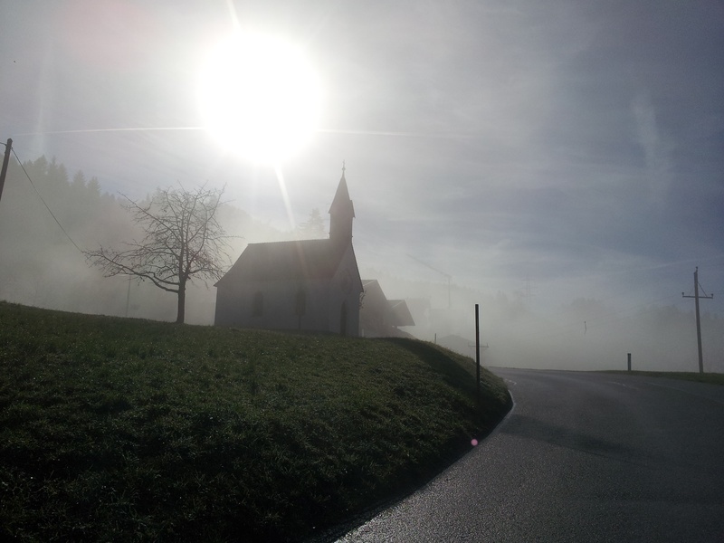 haze, steeple, building, sunny, the way forward, architecture, road, built structure, austria, white, spirit, plant, bright, church, religion, sky, jesus