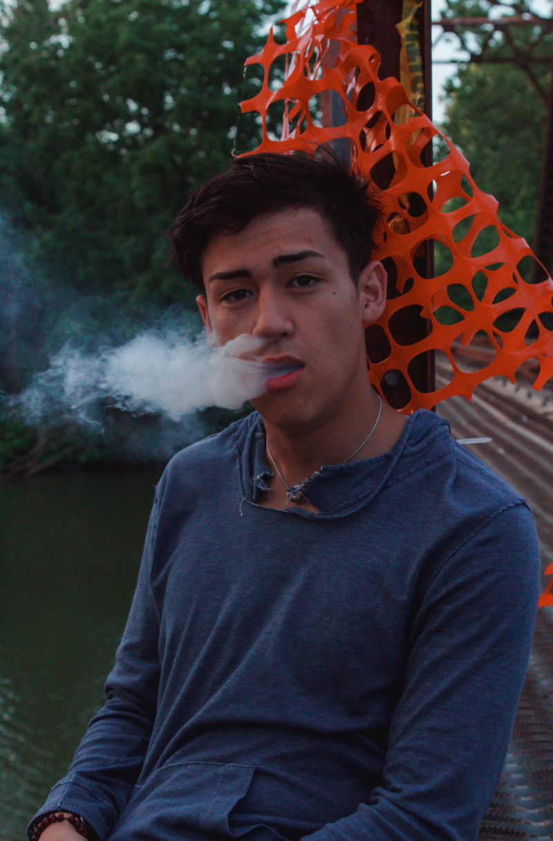 smoke - physical structure, springfield, leisure activity, waist up, teenage boys, front view, united states, bridges, looking at camera, outdoors, trees