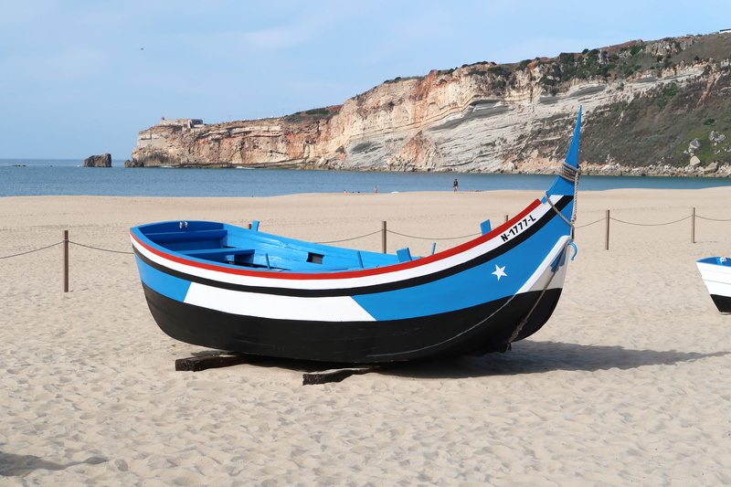 5K, sand, nature, sunlight, tranquility, no people, nazaré, blue, mode of transportation, nazare, boat, portugal, sky, outdoors, nautical vessel, day