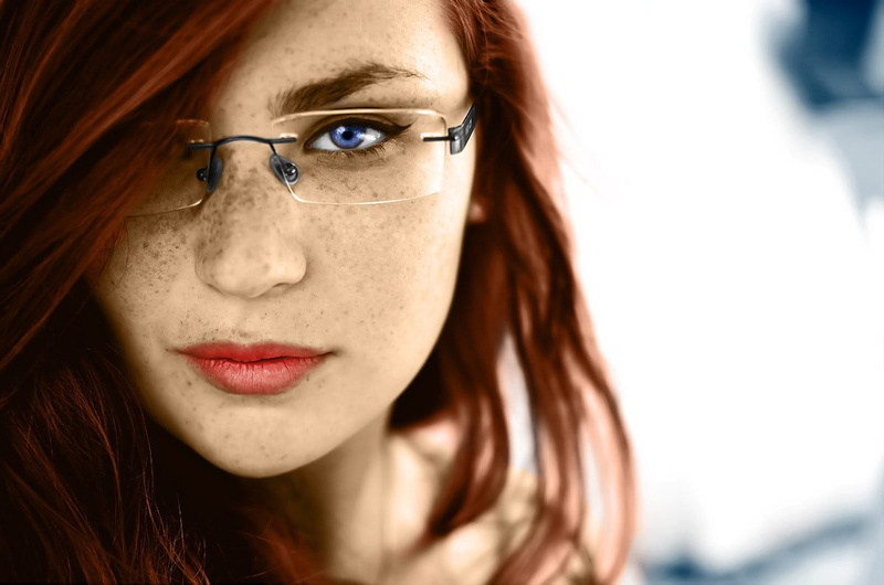 young adult, red lipstick, beautiful people, looking at viewer, close-up, hairstyle, model, dyed red hair, women with glasses, glasses, one person, freckles