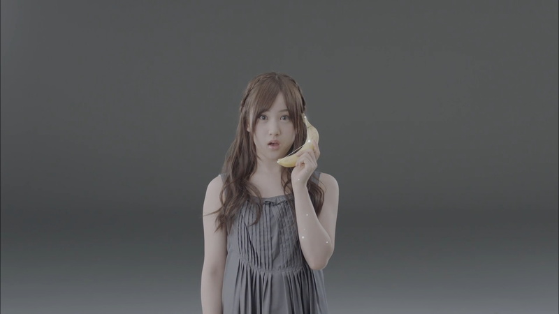 beautiful woman, portrait, Asian, black background, wavy hair, girls, front view, bananas, dress, looking at camera, beauty, hairstyle, hair, young adult