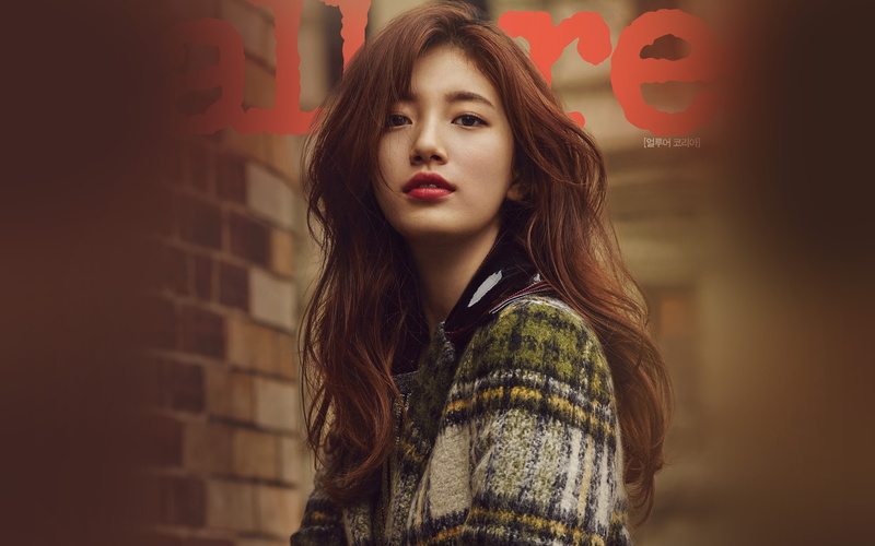 kpop, adult, women, contemplation, real people, brick, young women, beautiful woman, one person, looking at camera, waist up, young adult, brown hair, casual clothing