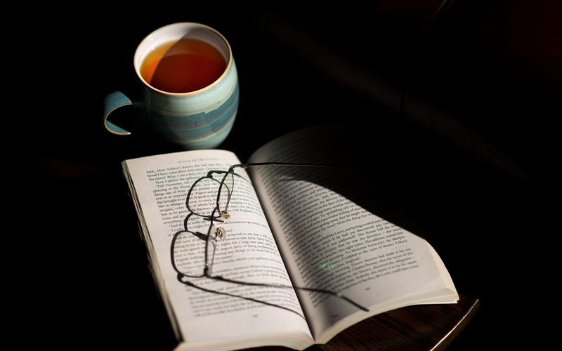 cup of tea, tea cup, open, beverage, education, coffee, table, eye glasses, publication, coffee cup, relaxing, cup, near, coffee - drink, glasses, studying