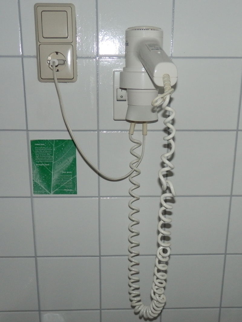 close-up, indoors, bad, flooring, phone cord, technology, communication, no people, power cable, wall - building feature, bathroom, landline phone, hairdryer
