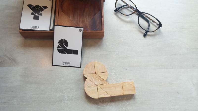 label, occupation, telephone, communication, healthcare, mobile phone, sign, text, table, high angle view, indoors, puzzle, connection, occupational, wood - material