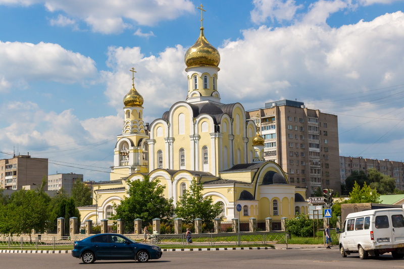 belief, building exterior, motor vehicle, summer, dome, orthodox, religion, no people, mode of transportation, nature, cloud - sky, sky, car, cathedral