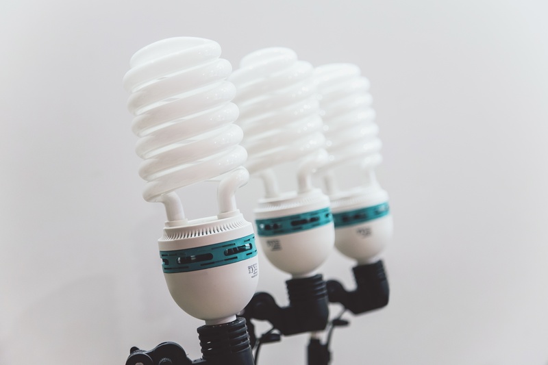power, no people, energy icons, bubls, side by side, three, focus on foreground, dose, white background, 5K, two objects, healthcare and medicine, indoors