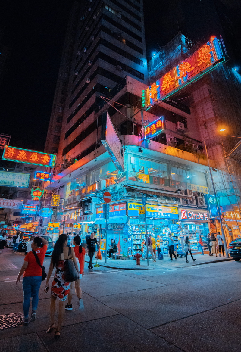 real people, illuminated, women, pedestrian, car, city, clothing, large group of people, shoe, urban, adult, walking, built structure, metropolis, apparel