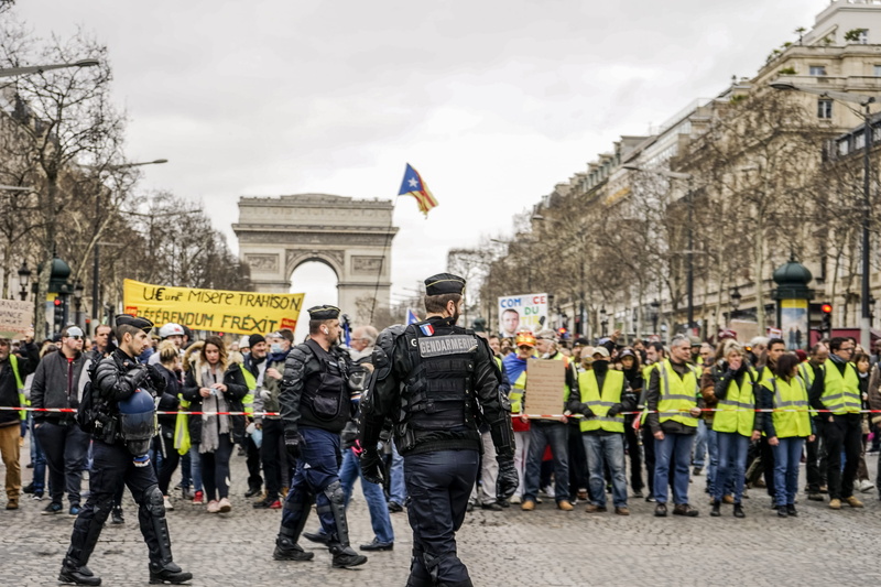 human, law, pants, people, 2K, man, military uniform, wearing, officer, patriotism, pedestrian, footwear, large group of people, government, suit, architecture