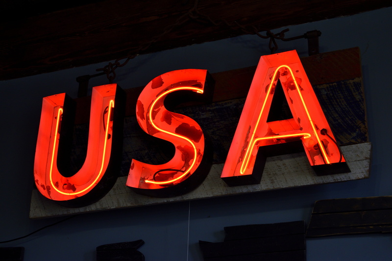 design, western script, text, low angle view, single word, information, dark, marketing, lighting equipment, business, icon, communication, message, consumerism