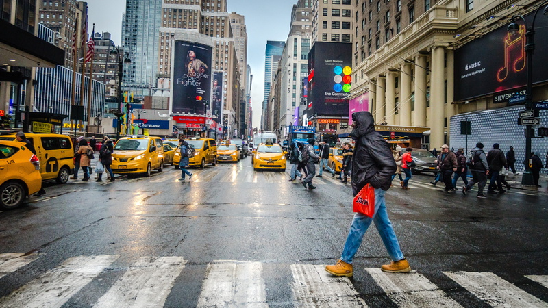 wheel, man, human, cab, built structure, automobile, penn station, architecture, car, crossing, outdoors, motor vehicle, apparel, footwear, new york, city