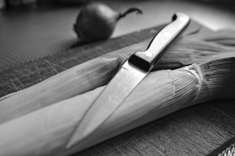 cutting, work tool, book, food and drink, onion, simplicity, art and craft, wellbeing, point, still life, close-up, shiny, kitchen, edge, indoors, steel