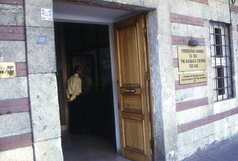 building exterior, istanbul, western script, built structure, city, day, men, cistern, building, adult, entrance, architecture, text, outdoors, door, doorway