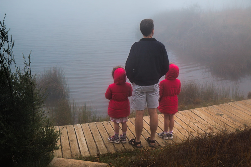 father, red, child, two people, jackets, leisure activity, women, family, dad, togetherness, man in black, lake, day, facing, nature, misty, twins, three
