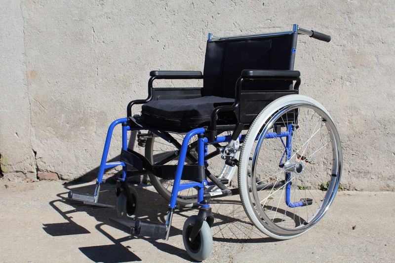 care, transportation, wall - building feature, no people, shadow, bicycle, wheelchair, volunteering, day, land vehicle, wheel, mode of transportation, nature