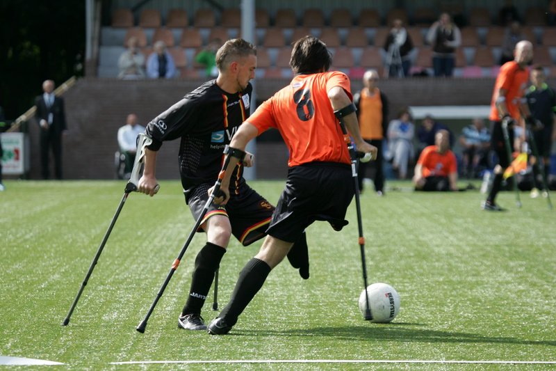 team, men, match - sport, soccer ball, show, amputation, sports equipment, sports, grass, athlete, competitive sport, championships, competition, incidental people