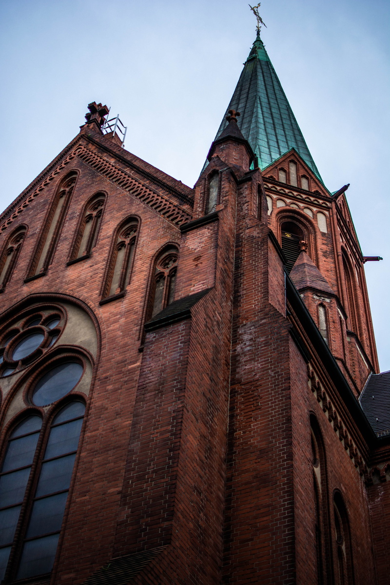 photography, building exterior, the past, sky, clear sky, place of worship, outside, angle, architecture, built structure, green, outdoors, day, low angle shot